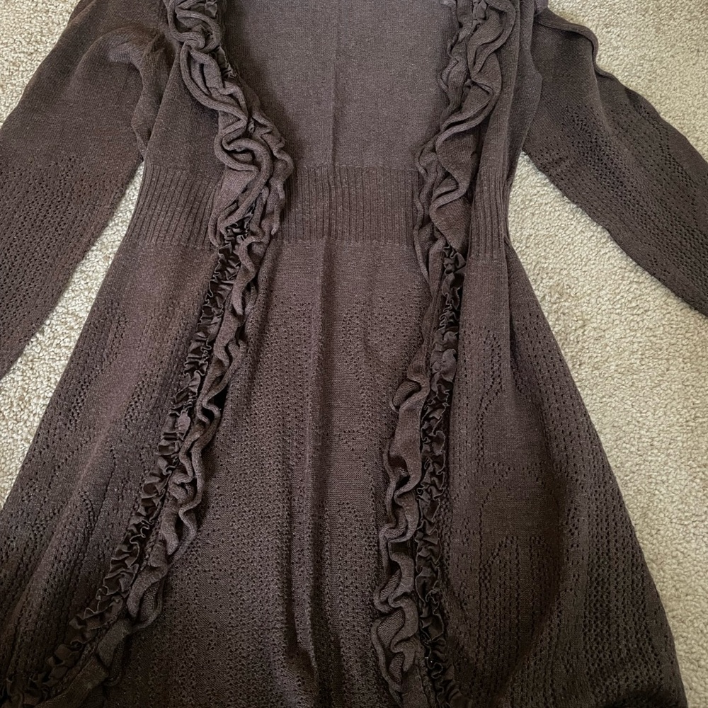 Beautiful ruffled cardigan.